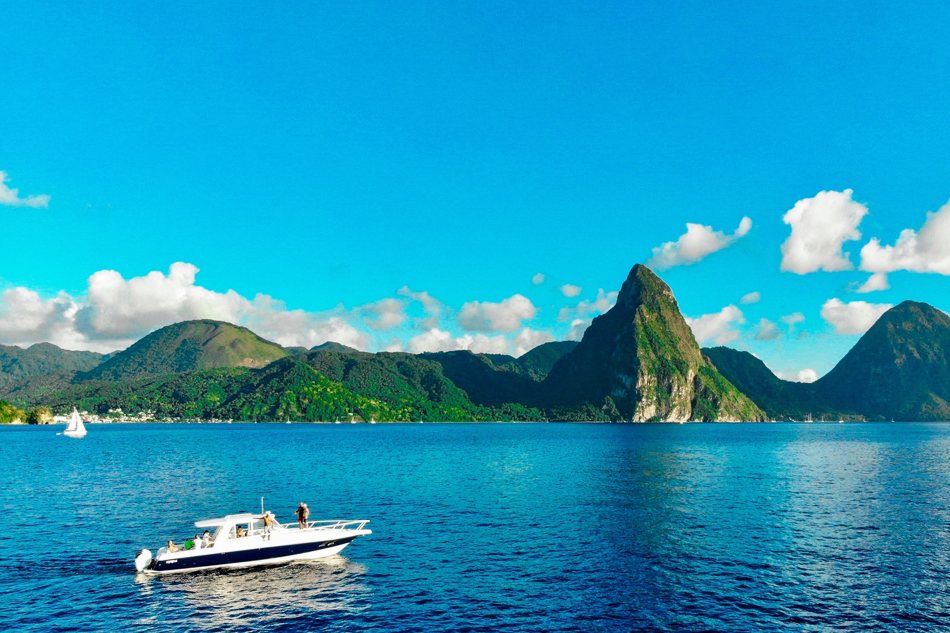 Speedboat: Visit the Piton Mountains, Mud Baths and Waterfall with Transportation