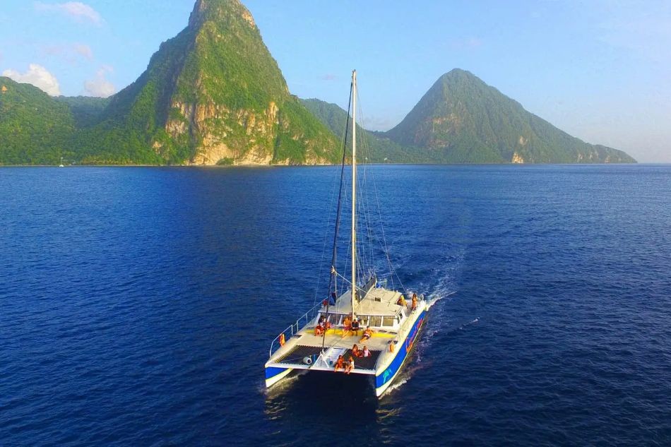 Sunset Catamaran Cruise in St. Lucia to the Pitons with Snorkeling and Transportation